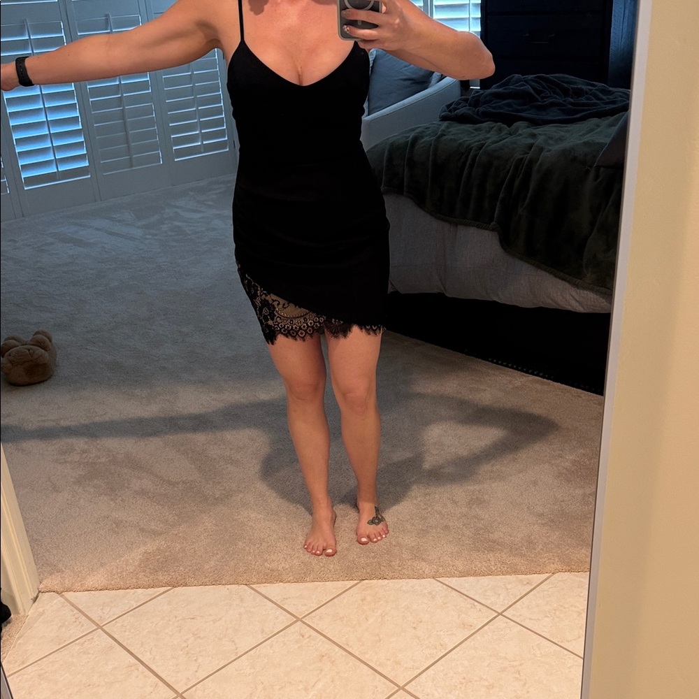 Lush Black Garment with Tag Detail